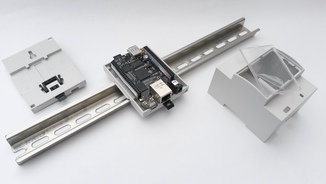 Wall mounting hole on enclosure backplane